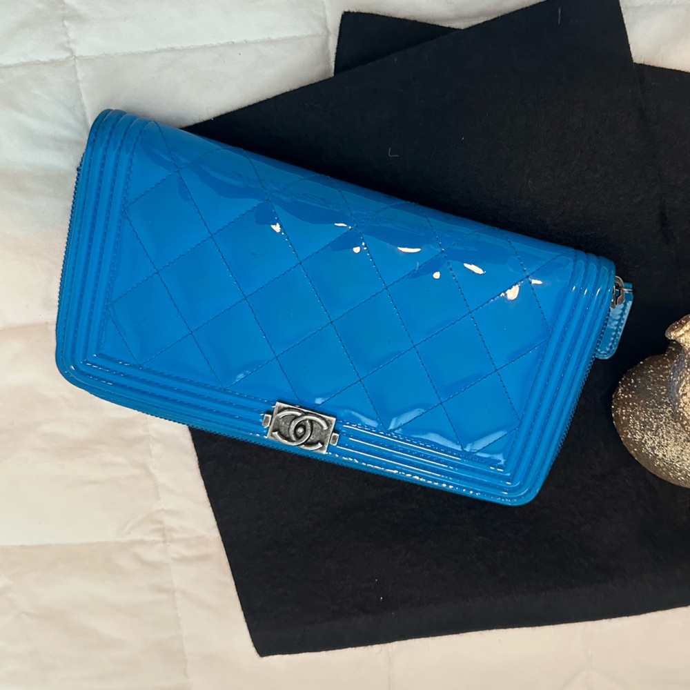 CHANEL Quilted Boy Zip Around Wallet Patent Leather in Blue